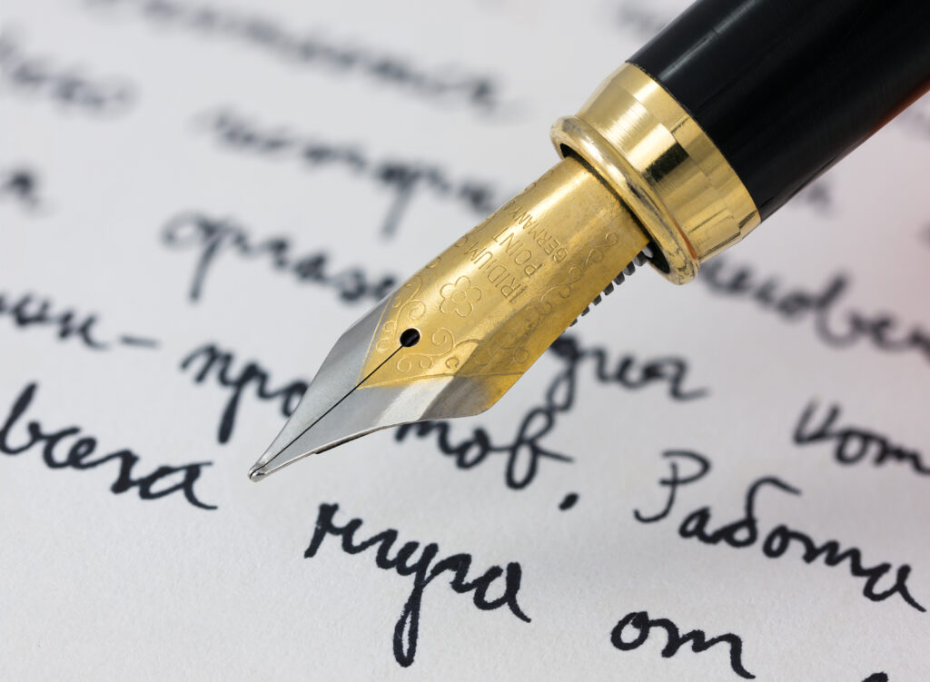 Fountain pen on paper — written contracts for performers and vendors in NJ
