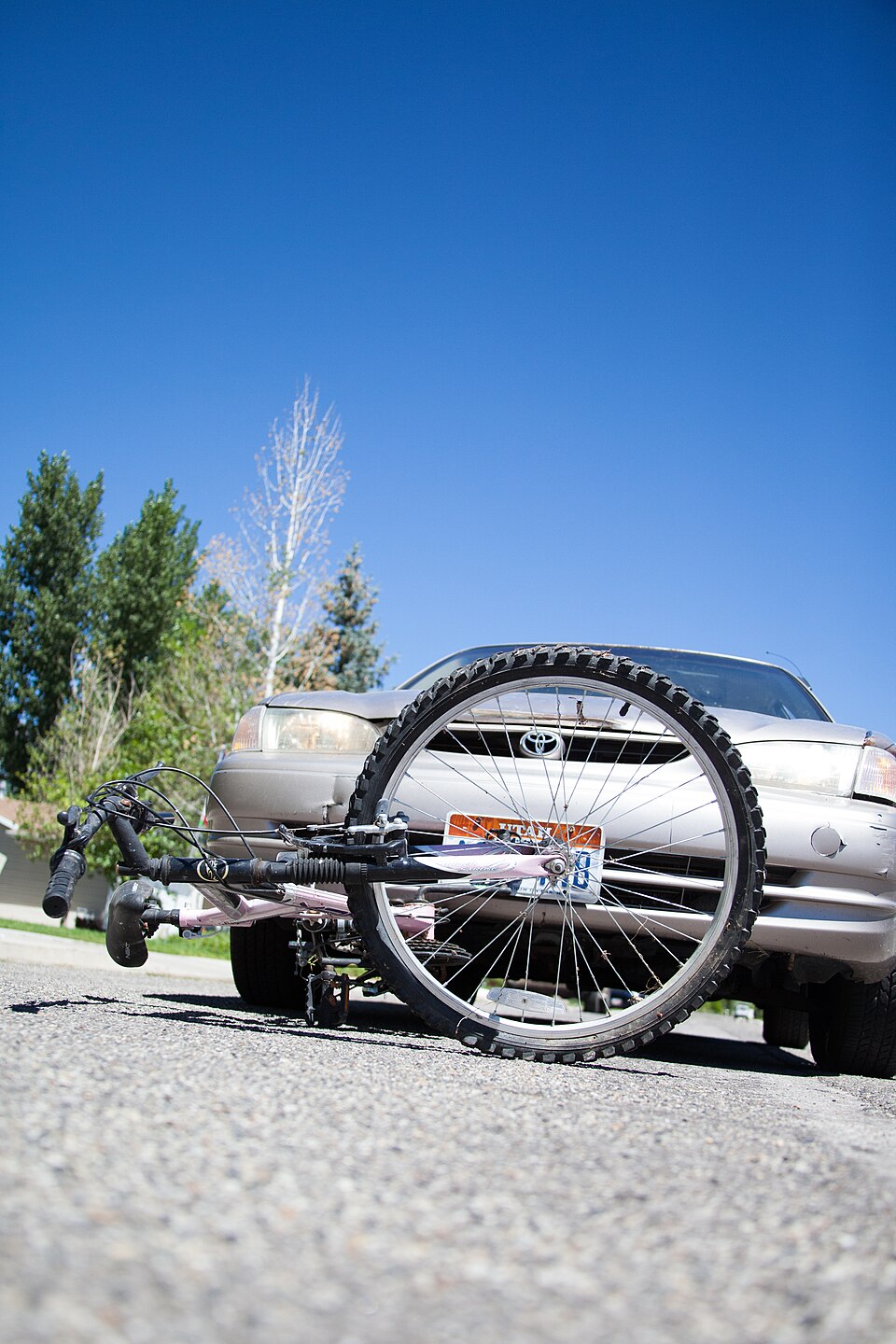 Bicycle and car accident scene representing personal injury cases in New Jersey